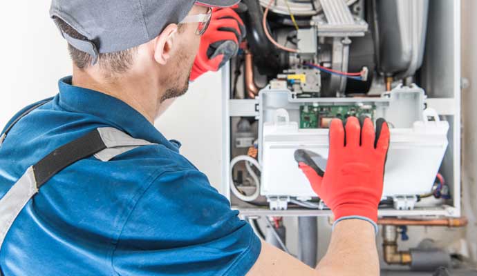 An expert repairing furnace