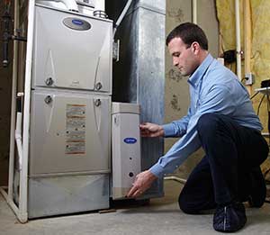 Carrier technicians inspecting ac