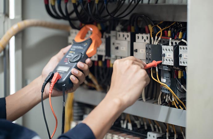 engineer measuring voltage