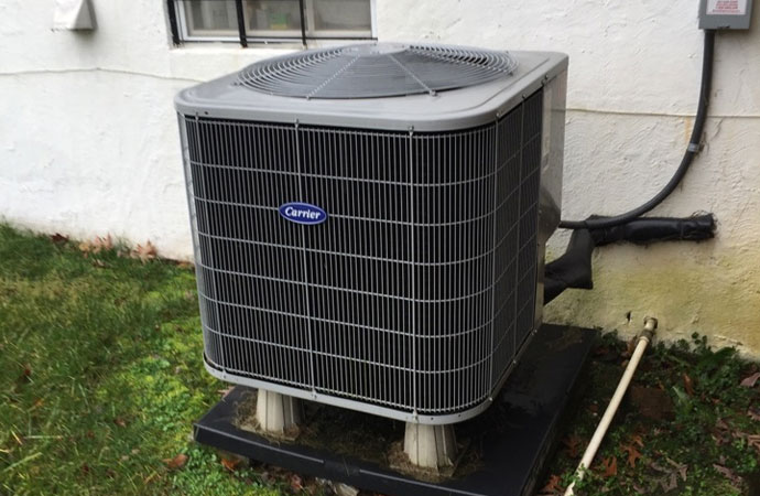Installed Carrier outdoor heat pump unit