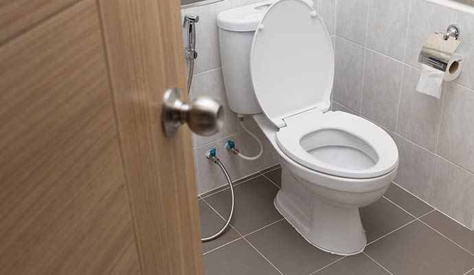 Clean toilet commode in a modern bathroom