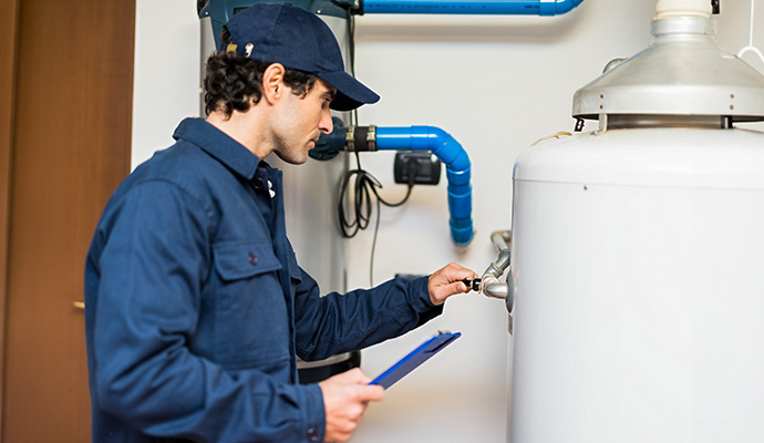 Expert maintaining water heater