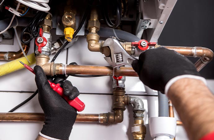 Expert repairing leaky pipe and fixtures