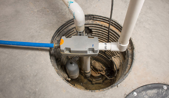 Installed submersible sump pump inside basement sump pit