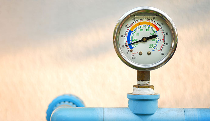Water pressure gauge measuring plumbing pipe pressure
